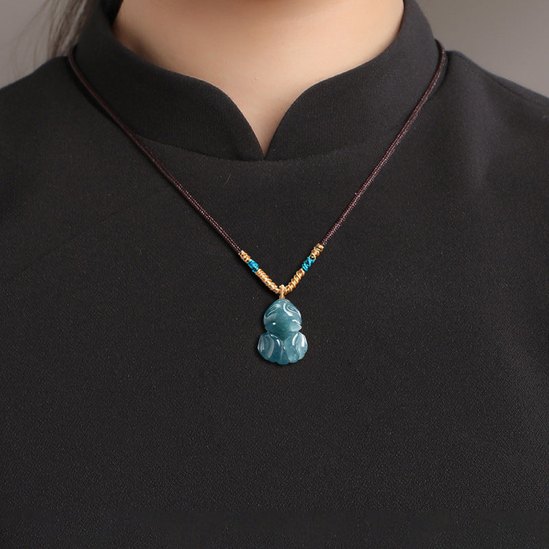 Blue Ice Jade Nine-Tailed Fox Pendant – Elegant Charm for Love & Wisdom